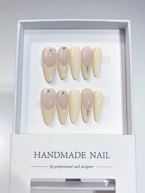 A071 - Long Nude Oval French tip Rhinestone VibeNailsLab