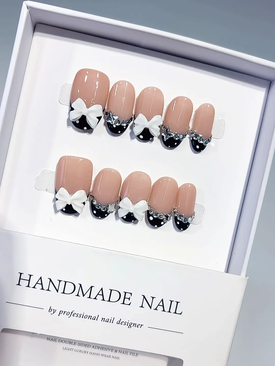 C452 - Medium Nude Black Oval French tip Bow Rhinestone VibeNailsLab