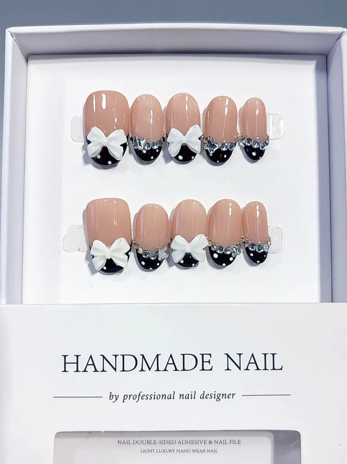 C452 - Medium Nude Black Oval French tip Bow Rhinestone VibeNailsLab