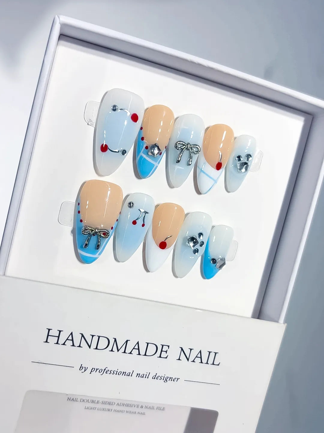 C455 - Medium Nude Blue Almond French tip Bow Heart VibeNailsLab