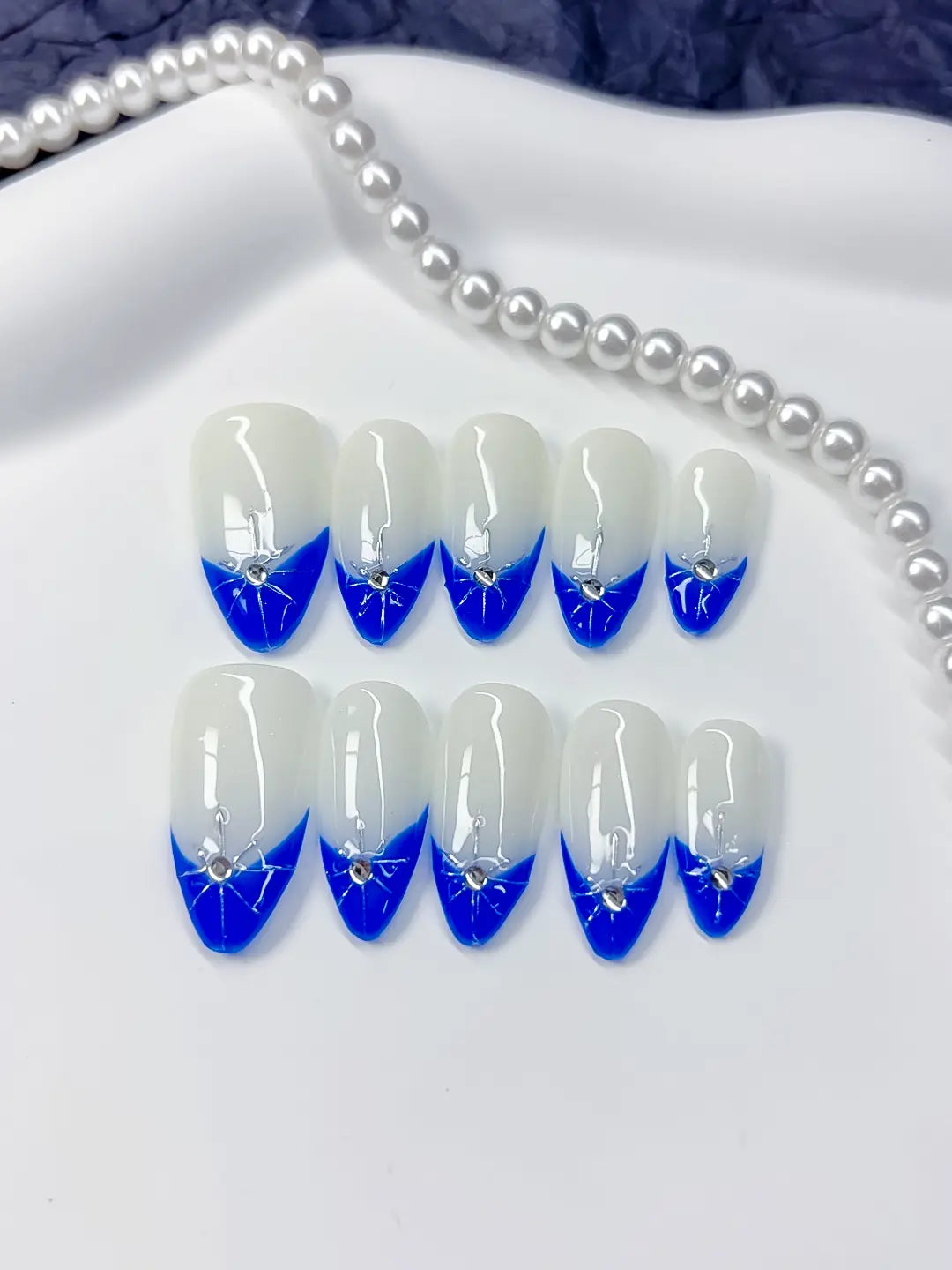 C368 - Medium Blue Almond French tip Rhinestone