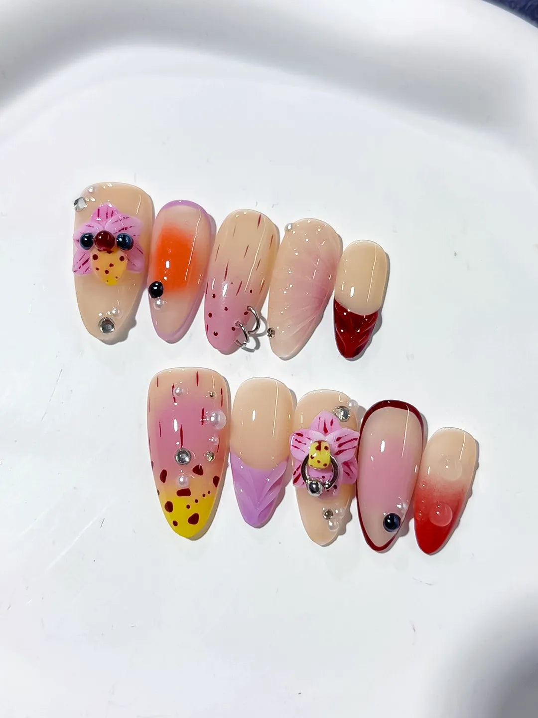 D361 - Medium Nude Pink Almond Abstract Bow Ladybug