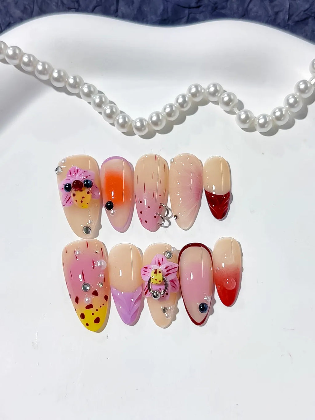 D361 - Medium Nude Pink Almond Abstract Bow Ladybug