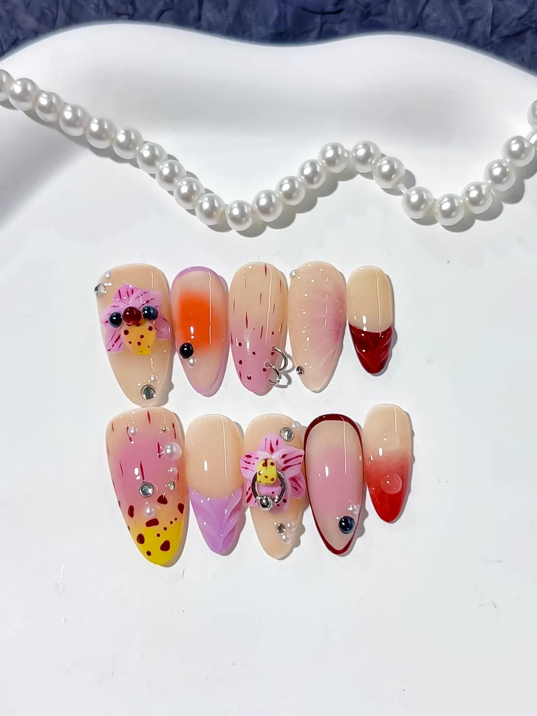 D361 - Medium Nude Pink Almond Abstract Bow Ladybug