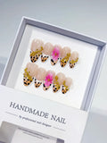 D382 - Medium Nude Black Almond French tip Flower Animal Print VibeNailsLab