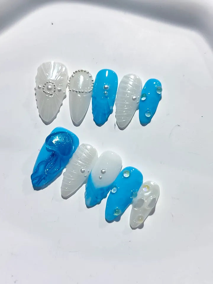 D387 - Medium Blue White Almond Abstract Bow Pearl VibeNailsLab