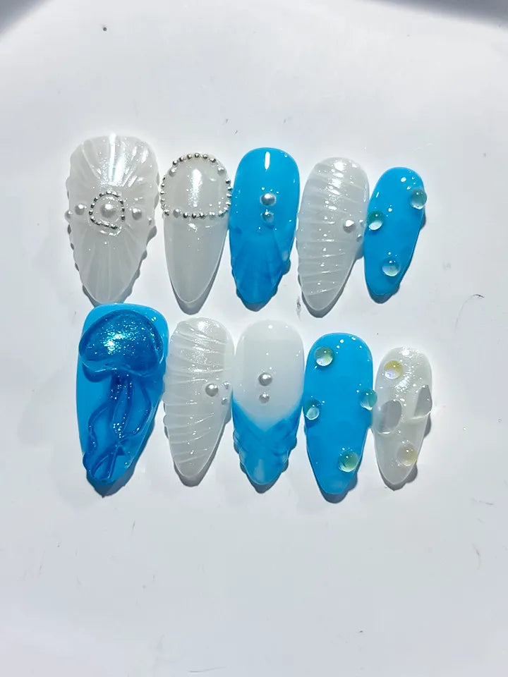 D387 - Medium Blue White Almond Abstract Bow Pearl VibeNailsLab