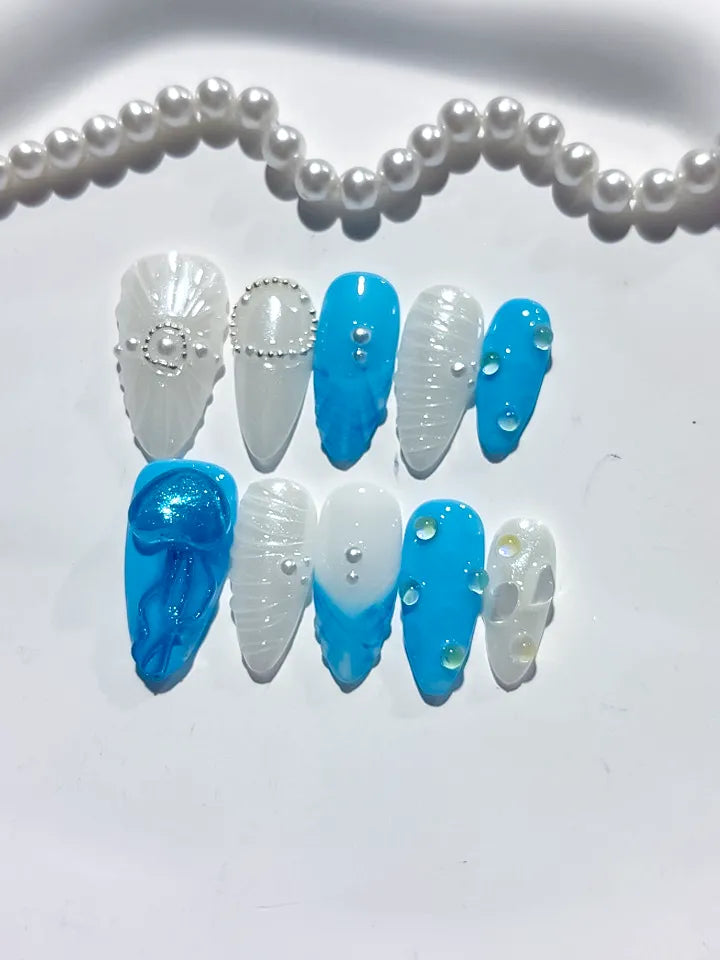 D387 - Medium Blue White Almond Abstract Bow Pearl VibeNailsLab