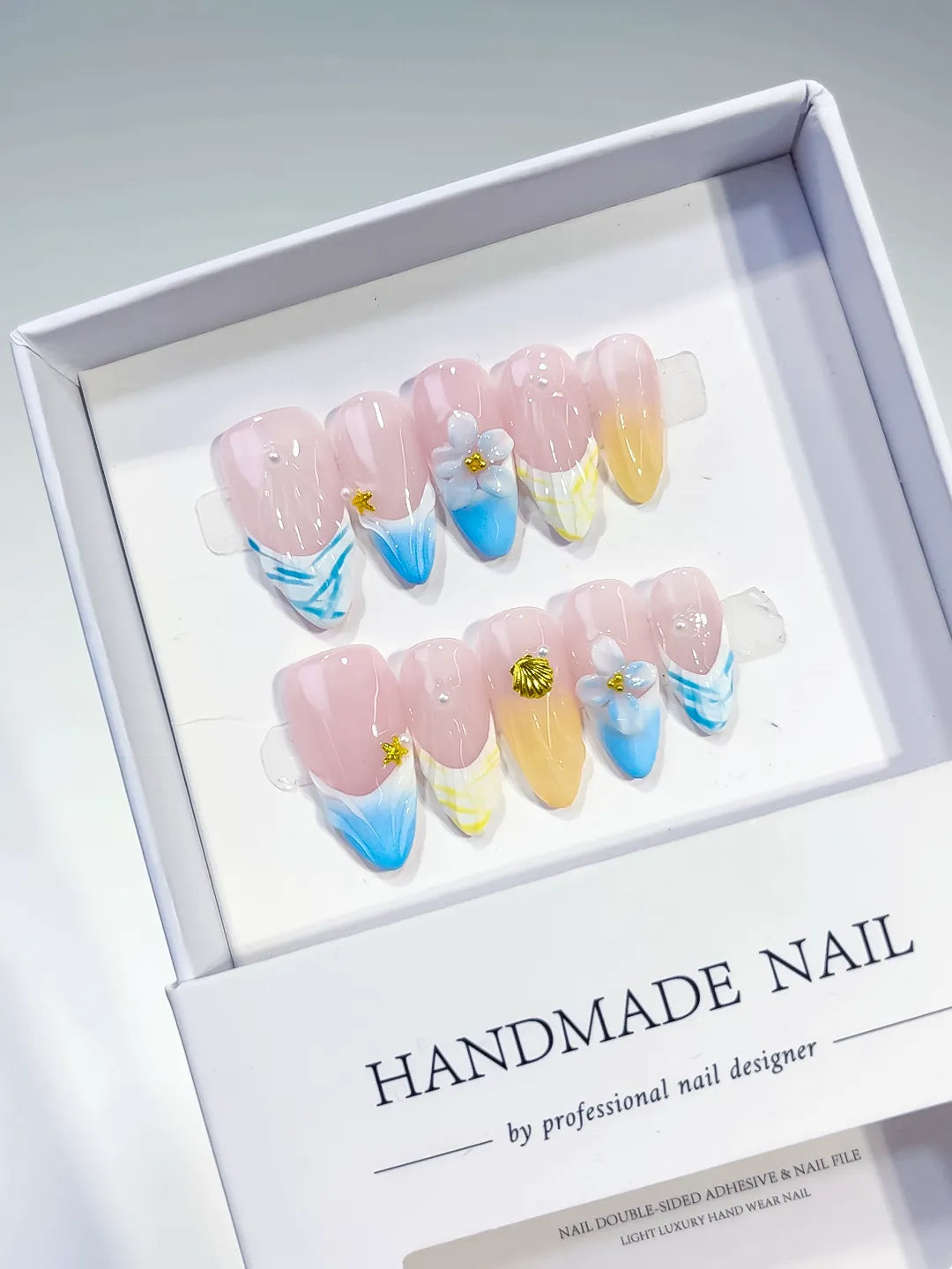D392 - Medium Nude Blue Almond French tip Flower Shell VibeNailsLab