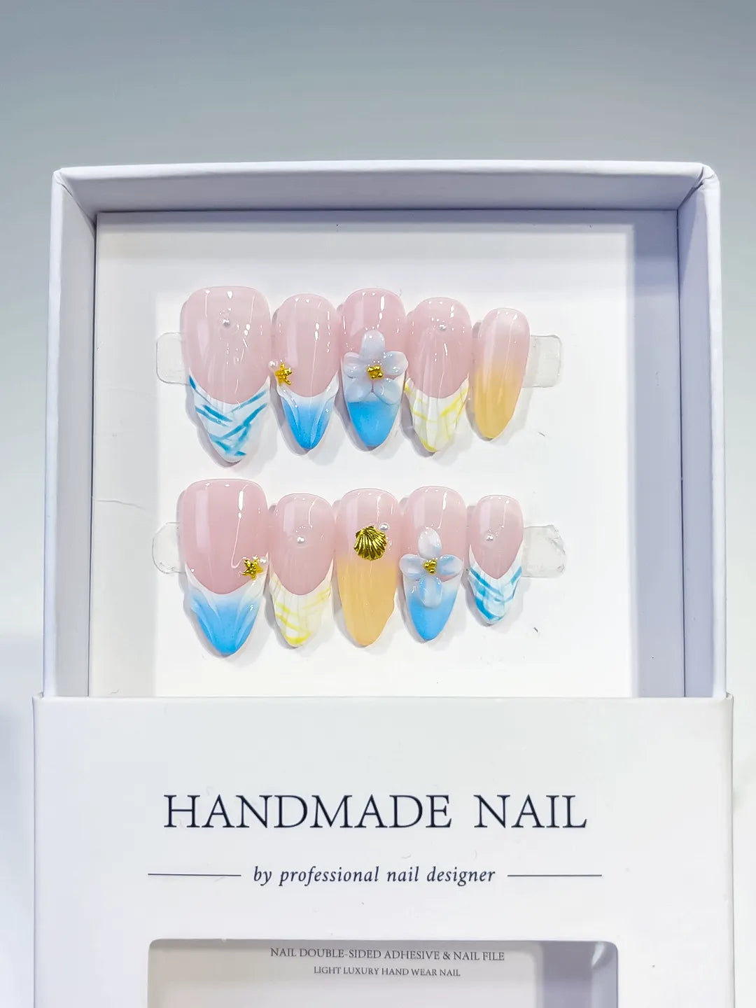 D392 - Medium Nude Blue Almond French tip Flower Shell VibeNailsLab