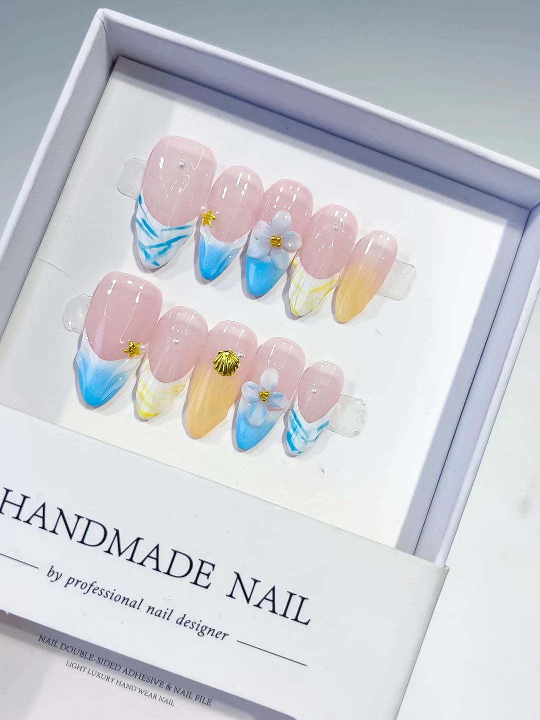 D392 - Medium Nude Blue Almond French tip Flower Shell
