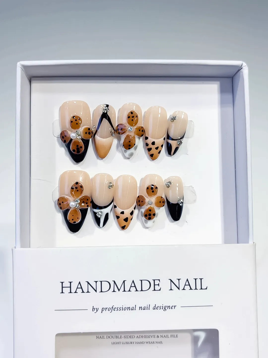 D401 - Medium Nude Black Almond French tip Cookie Animal Print VibeNailsLab
