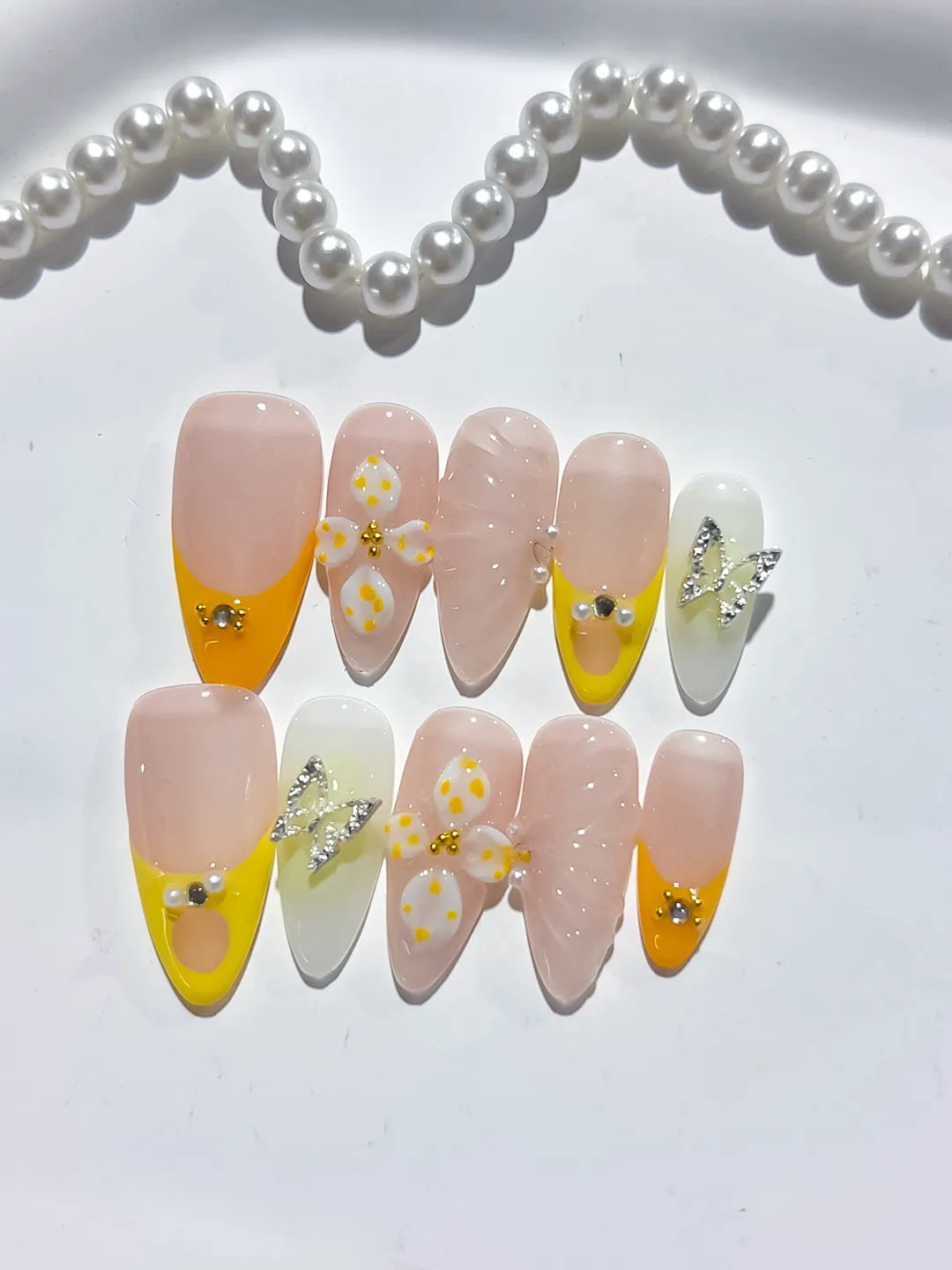 D428 - Medium Nude Yellow Almond French tip Flower Metallic Charm