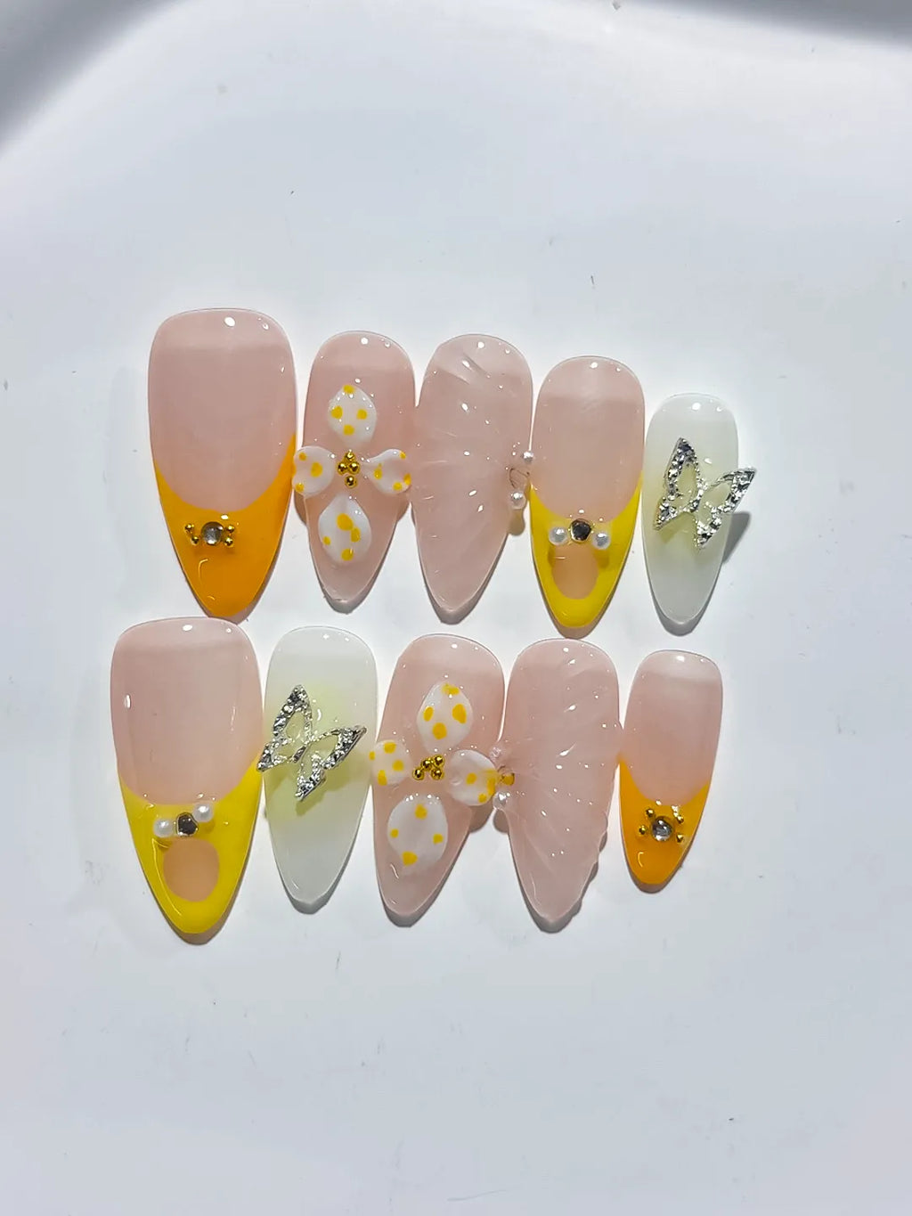 D428 - Medium Nude Yellow Almond French tip Flower Metallic Charm