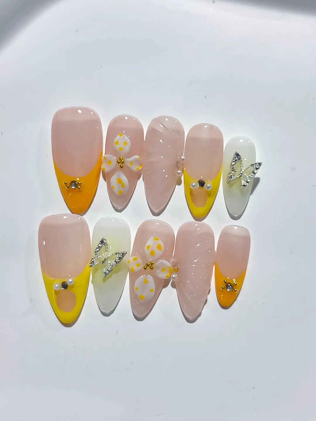 D428 - Medium Nude Yellow Almond French tip Flower Metallic Charm