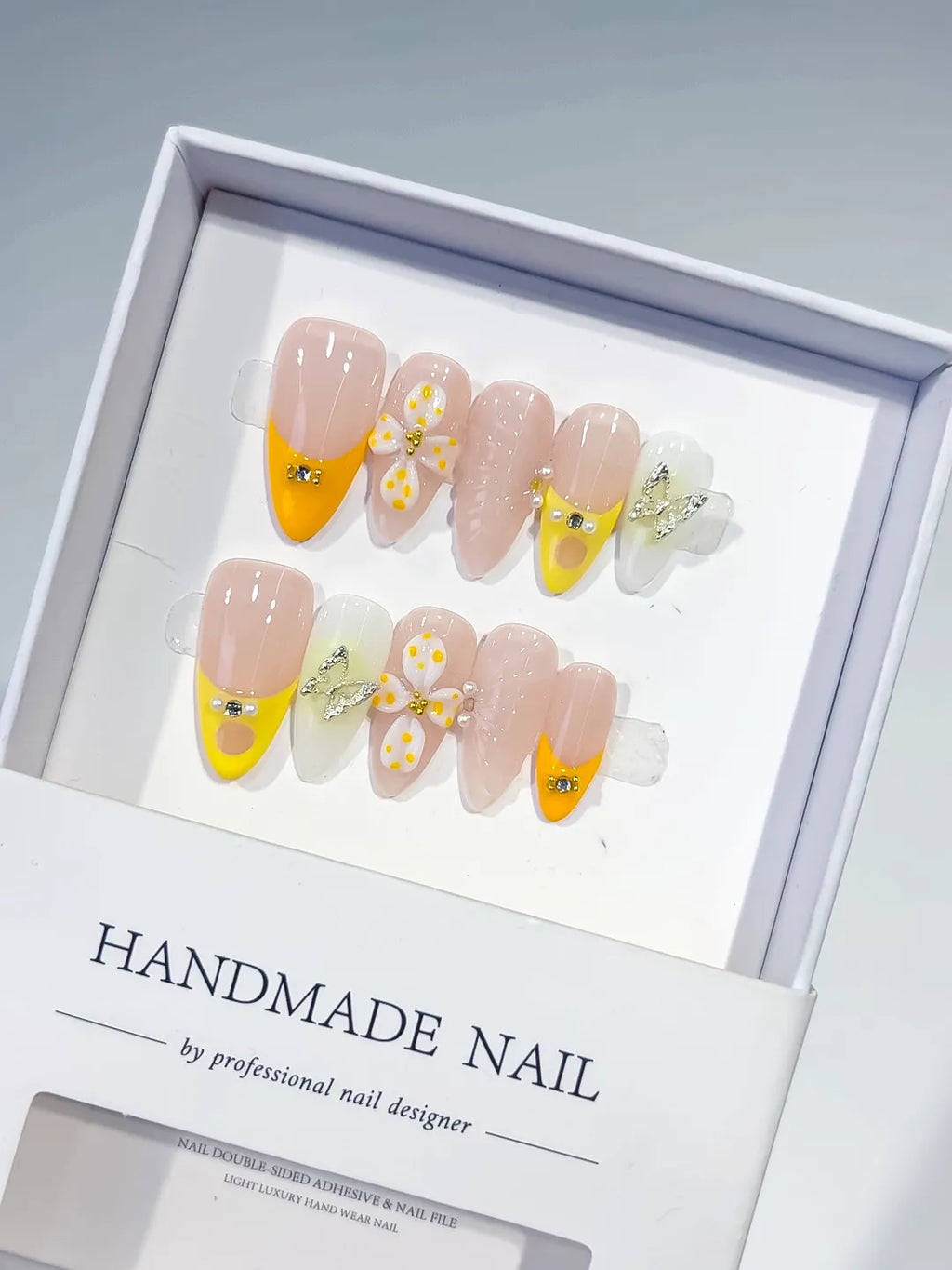 D428 - Medium Nude Yellow Almond French tip Flower Metallic Charm