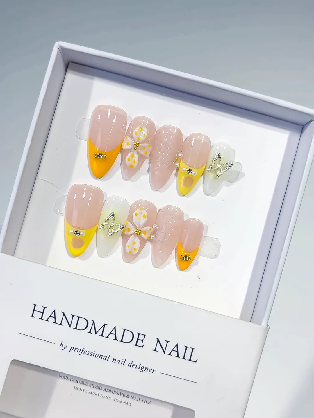D428 - Medium Nude Yellow Almond French tip Flower Metallic Charm