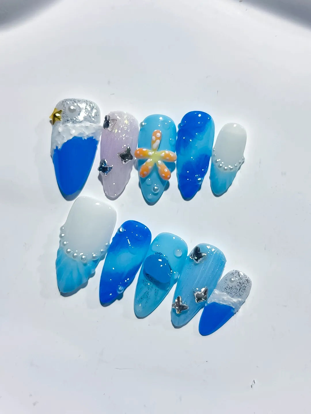 D434 - Medium Blue White Almond Glitter Flower Star