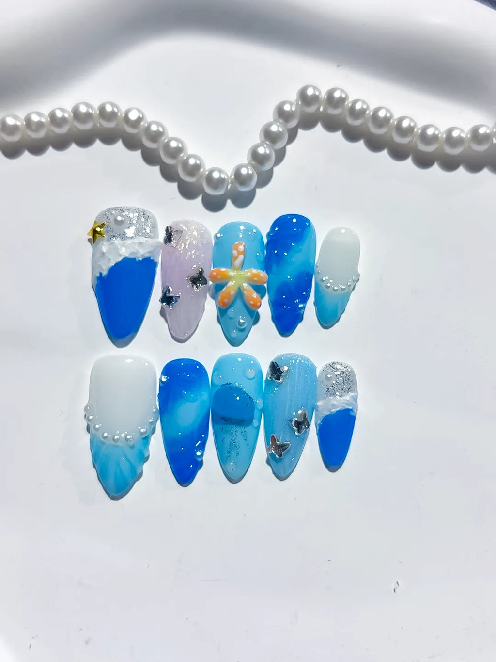 D434 - Medium Blue White Almond Glitter Flower Star