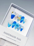 D434 - Medium Blue White Almond Glitter Flower Star
