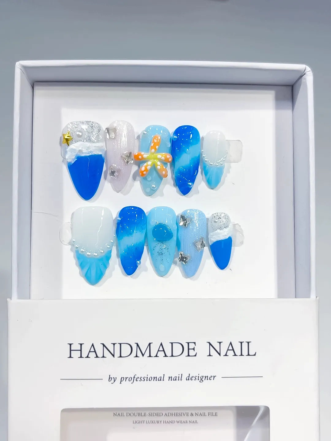 D434 - Medium Blue White Almond Glitter Flower Star