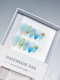 D438 - Medium White Blue Almond Ombre Star Shell