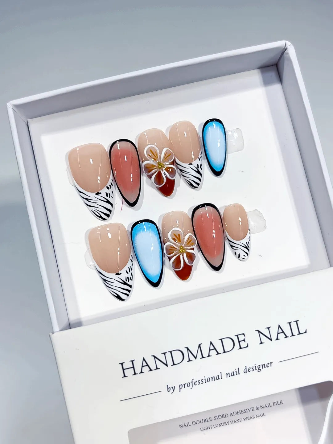 D443 - Medium Nude Blue Almond Abstract Flower Animal Print