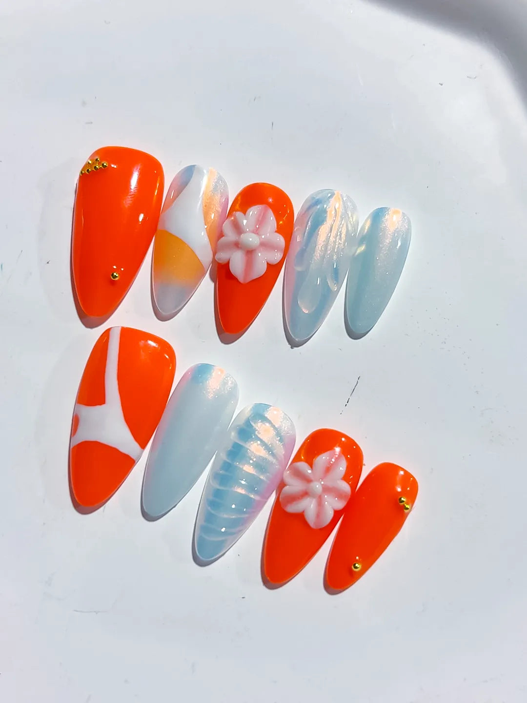 D466 - Medium Orange White Almond Abstract Flower Shell