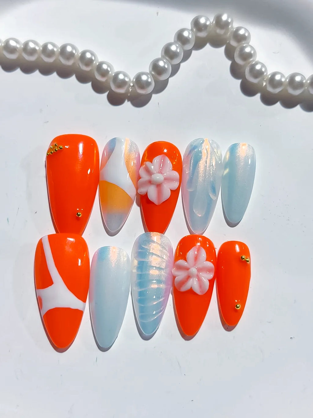 D466 - Medium Orange White Almond Abstract Flower Shell