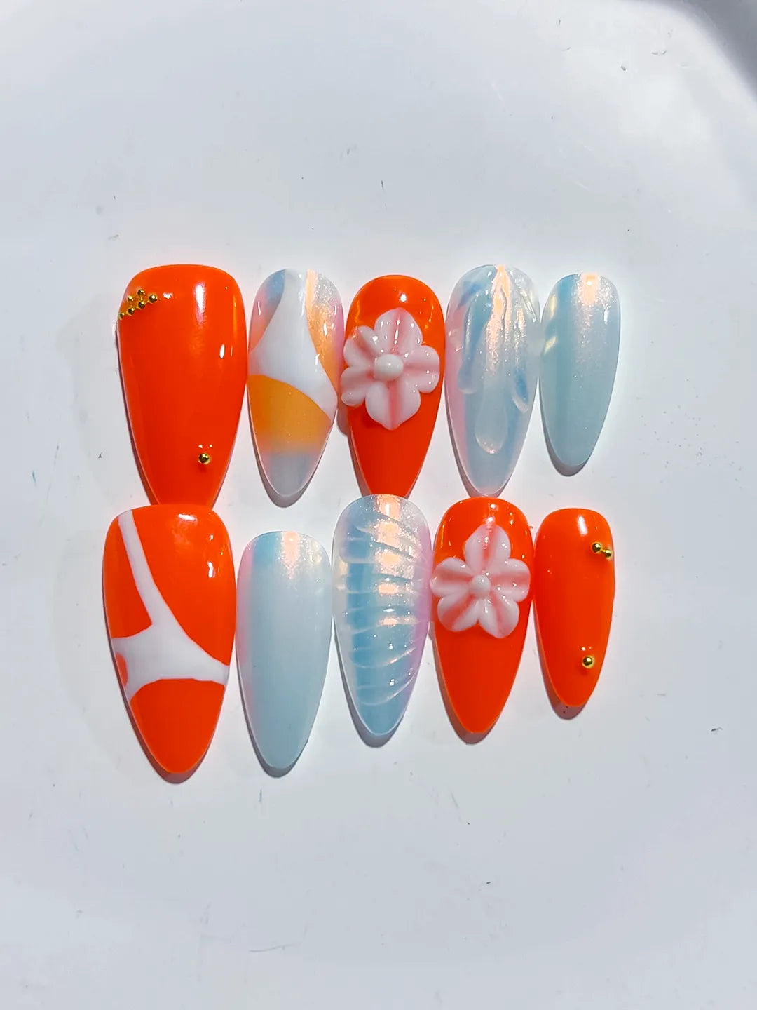 D466 - Medium Orange White Almond Abstract Flower Shell