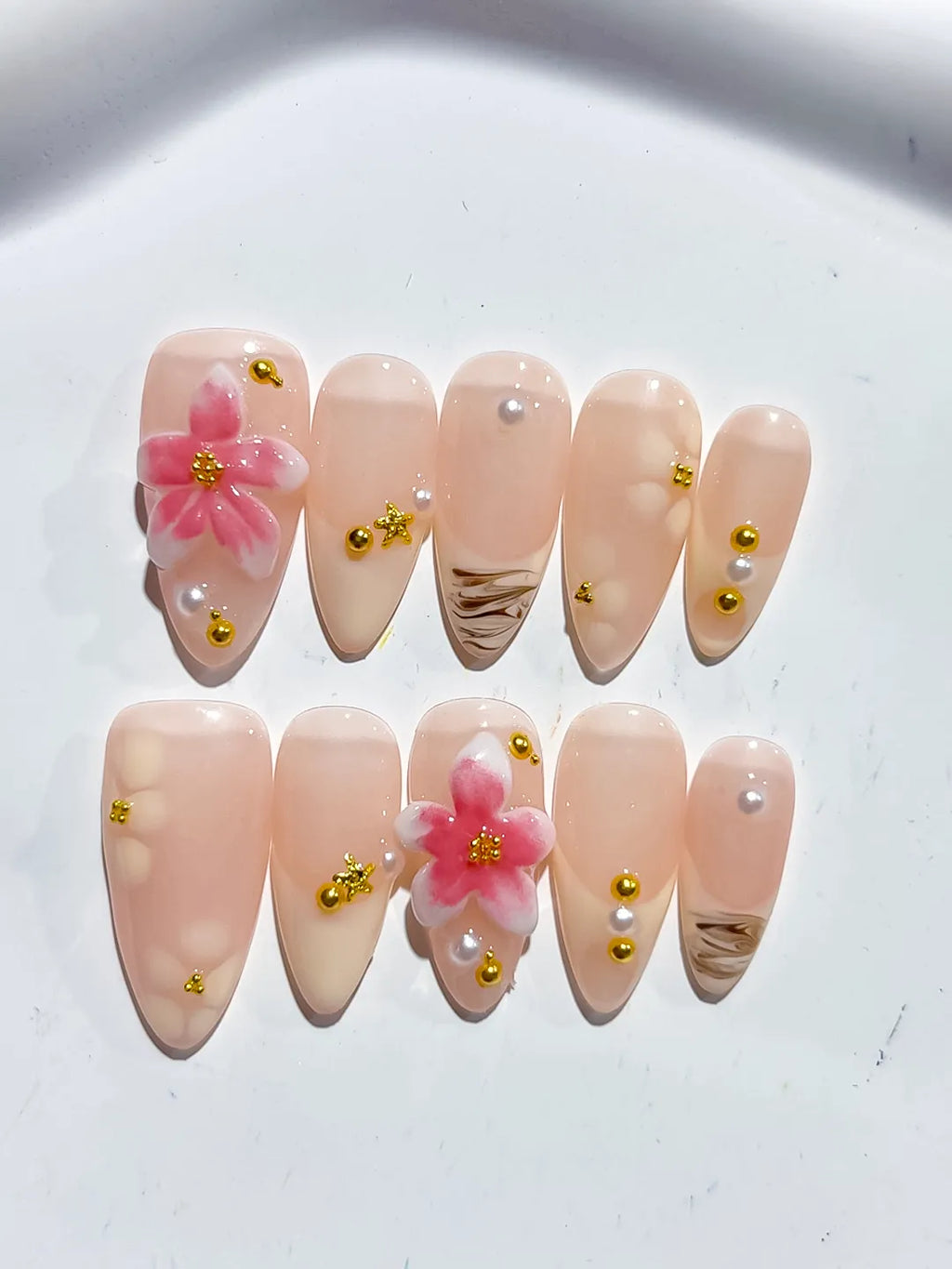 D479 - Medium Nude Pink Almond Solid color Flower Metallic Charm