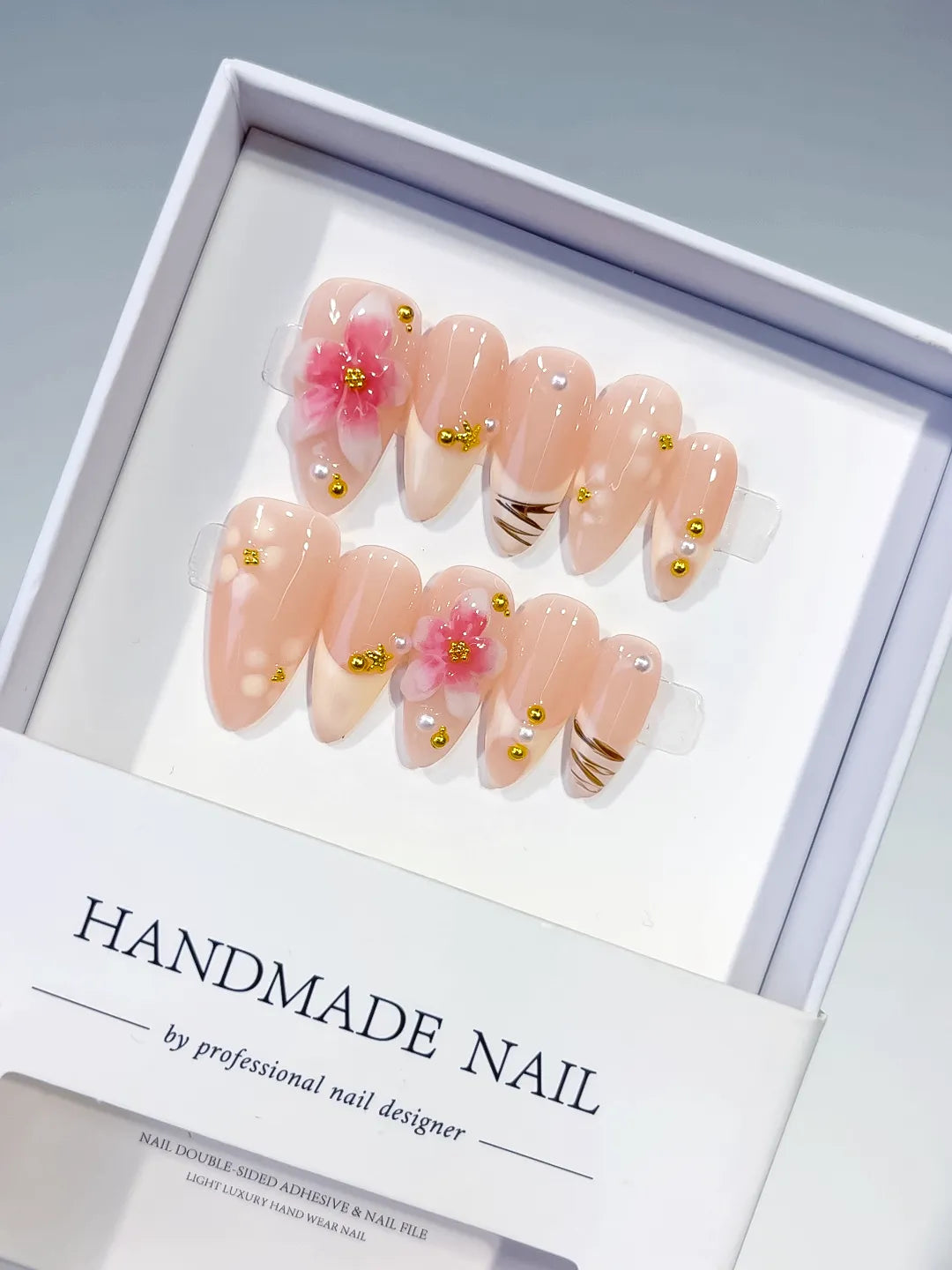 D479 - Medium Nude Pink Almond Solid color Flower Metallic Charm