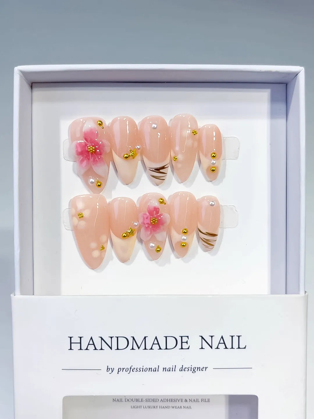 D479 - Medium Nude Pink Almond Solid color Flower Metallic Charm