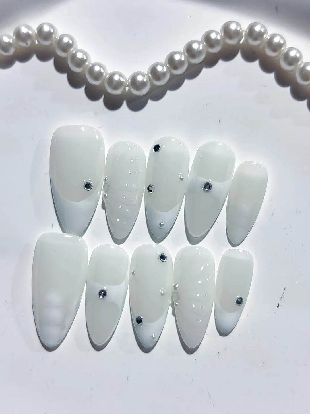 D480 - Medium White Almond Solid color Rhinestone Shell