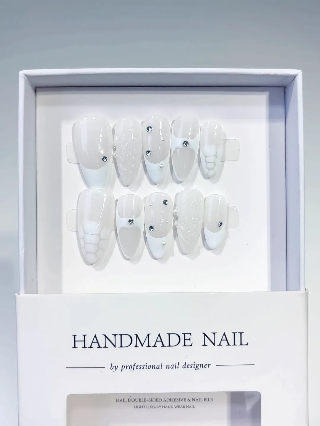 D480 - Medium White Almond Solid color Rhinestone Shell