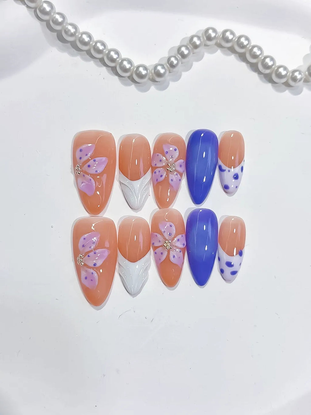 D494 - Medium Nude Blue Almond French tip Flower Dot Pattern