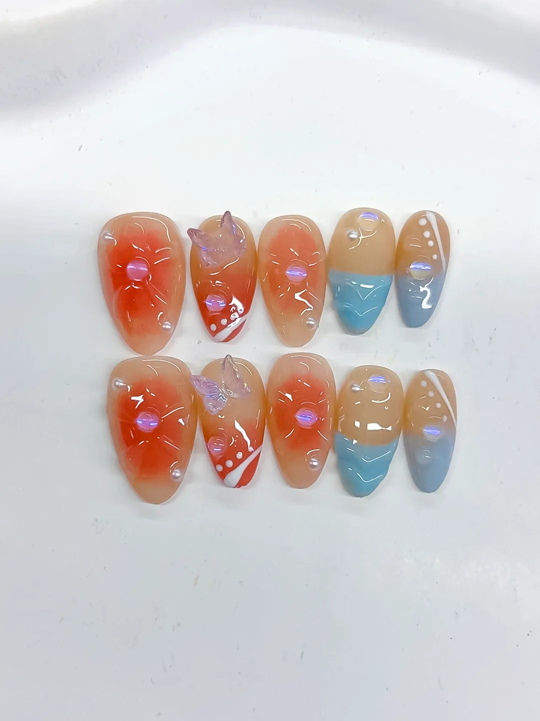 D506 - Short Nude Orange Almond Abstract Flower Bow