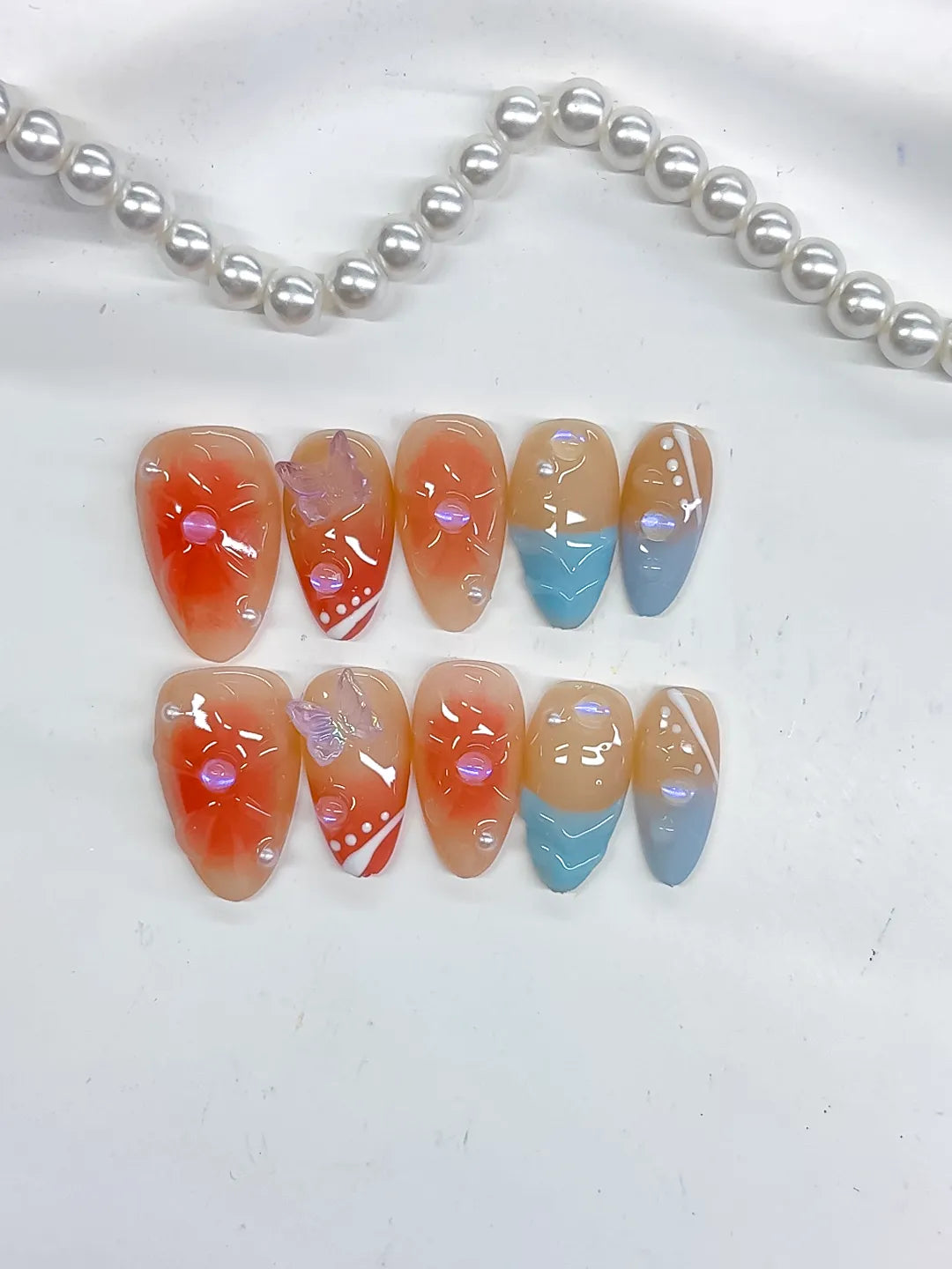 D506 - Short Nude Orange Almond Abstract Flower Bow