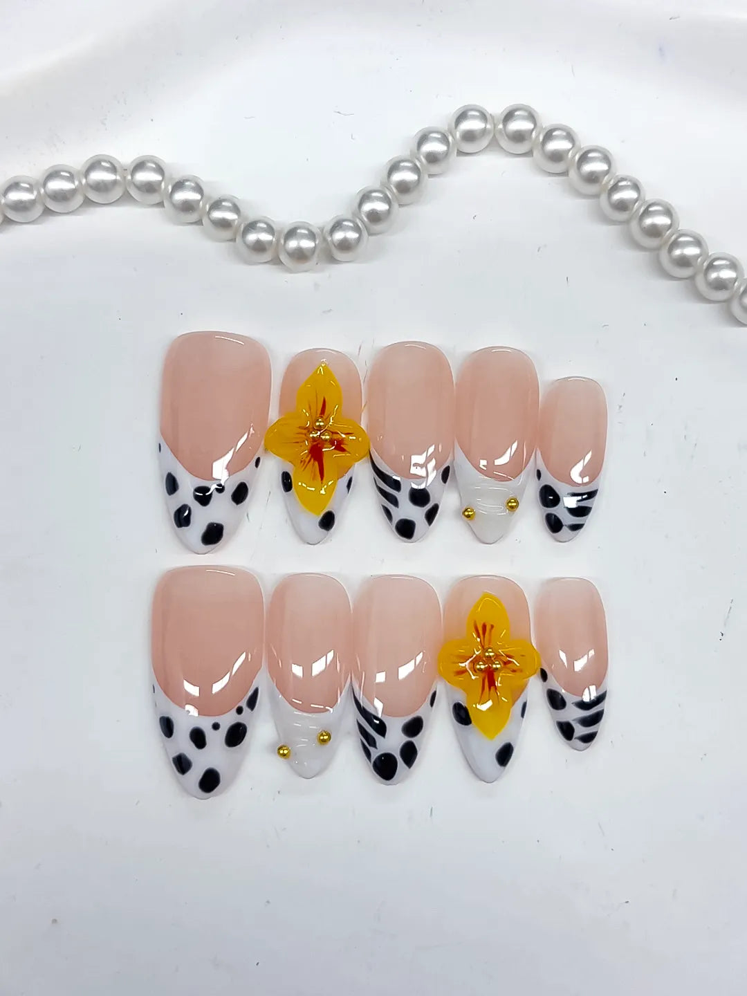 D512 - Medium Nude Black Almond French tip Flower Dot Pattern