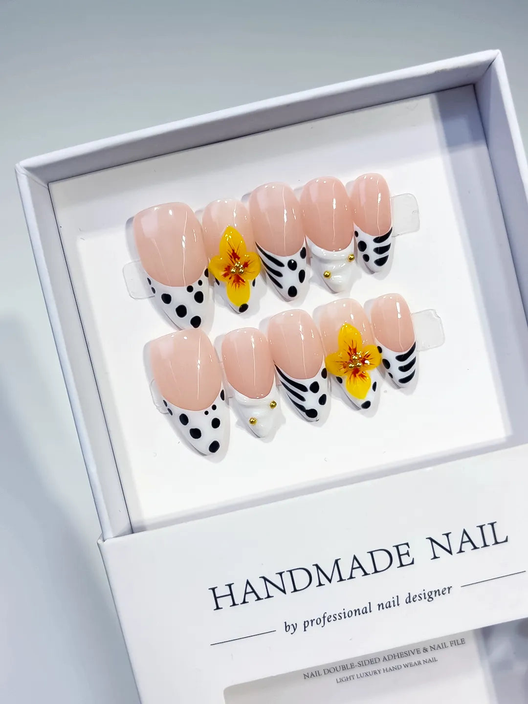 D512 - Medium Nude Black Almond French tip Flower Dot Pattern