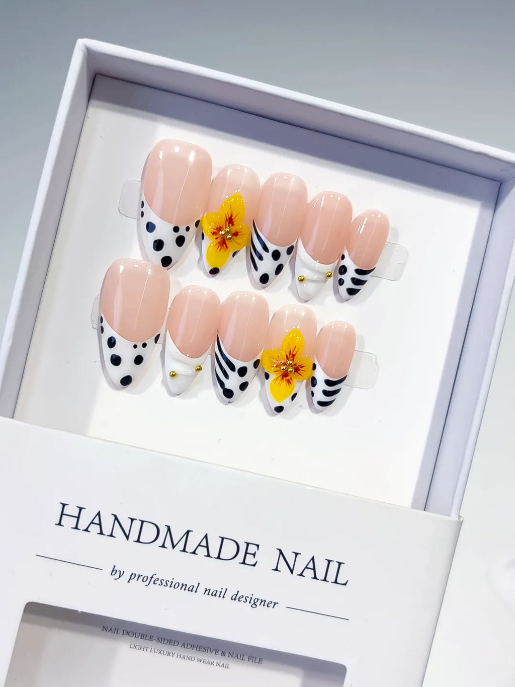 D512 - Medium Nude Black Almond French tip Flower Dot Pattern