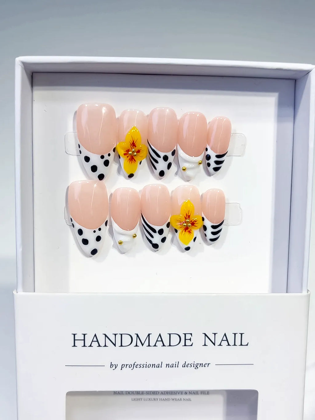 D512 - Medium Nude Black Almond French tip Flower Dot Pattern
