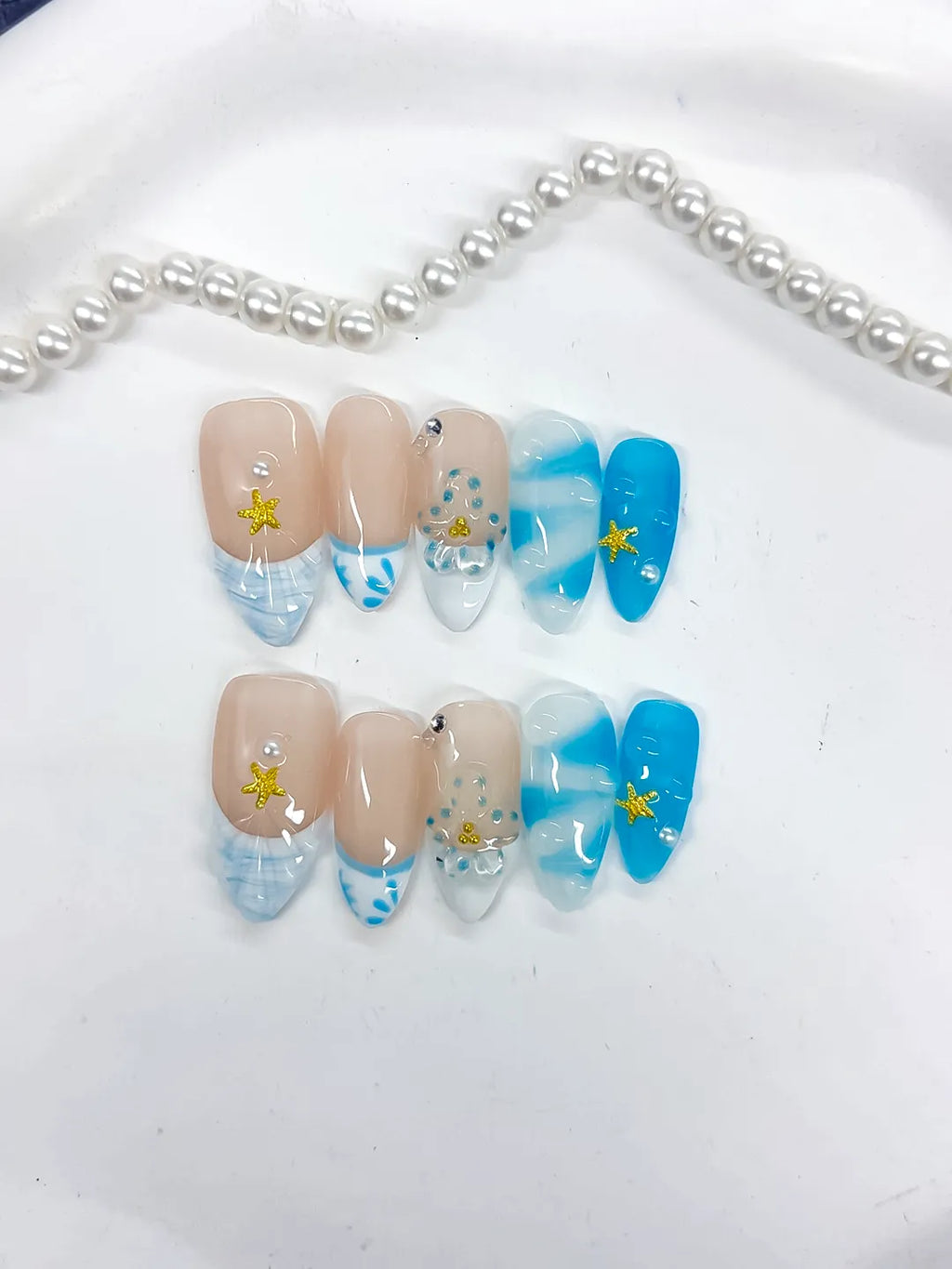 D514 - Medium Nude Blue Almond French tip Star Rhinestone