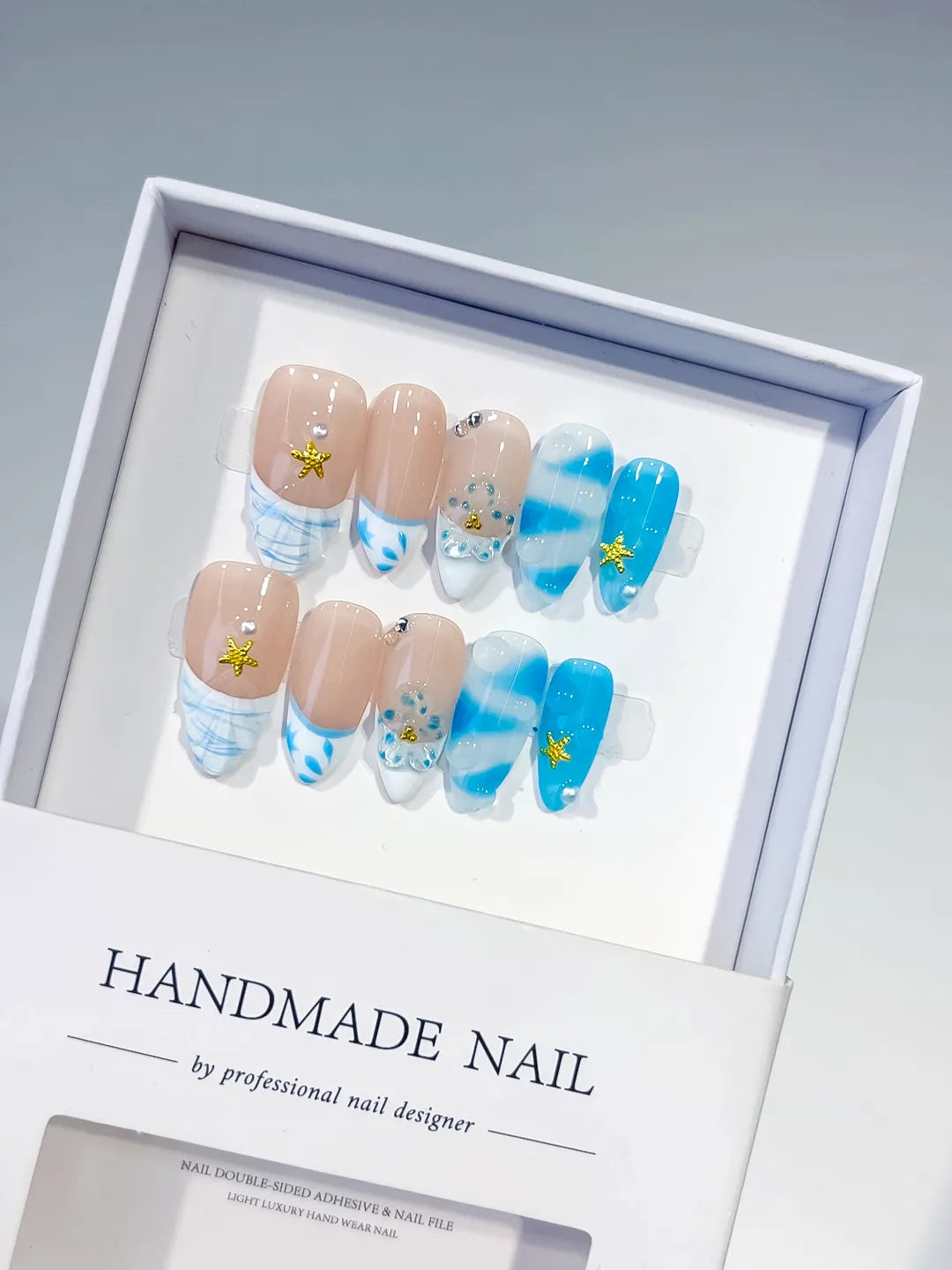D514 - Medium Nude Blue Almond French tip Star Rhinestone