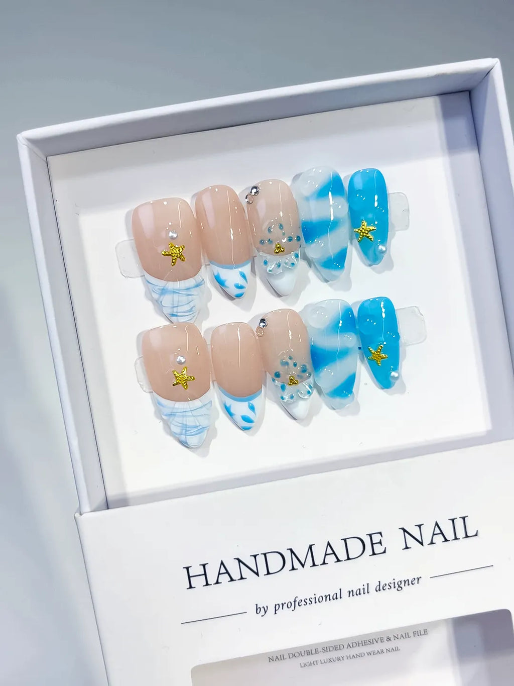 D514 - Medium Nude Blue Almond French tip Star Rhinestone