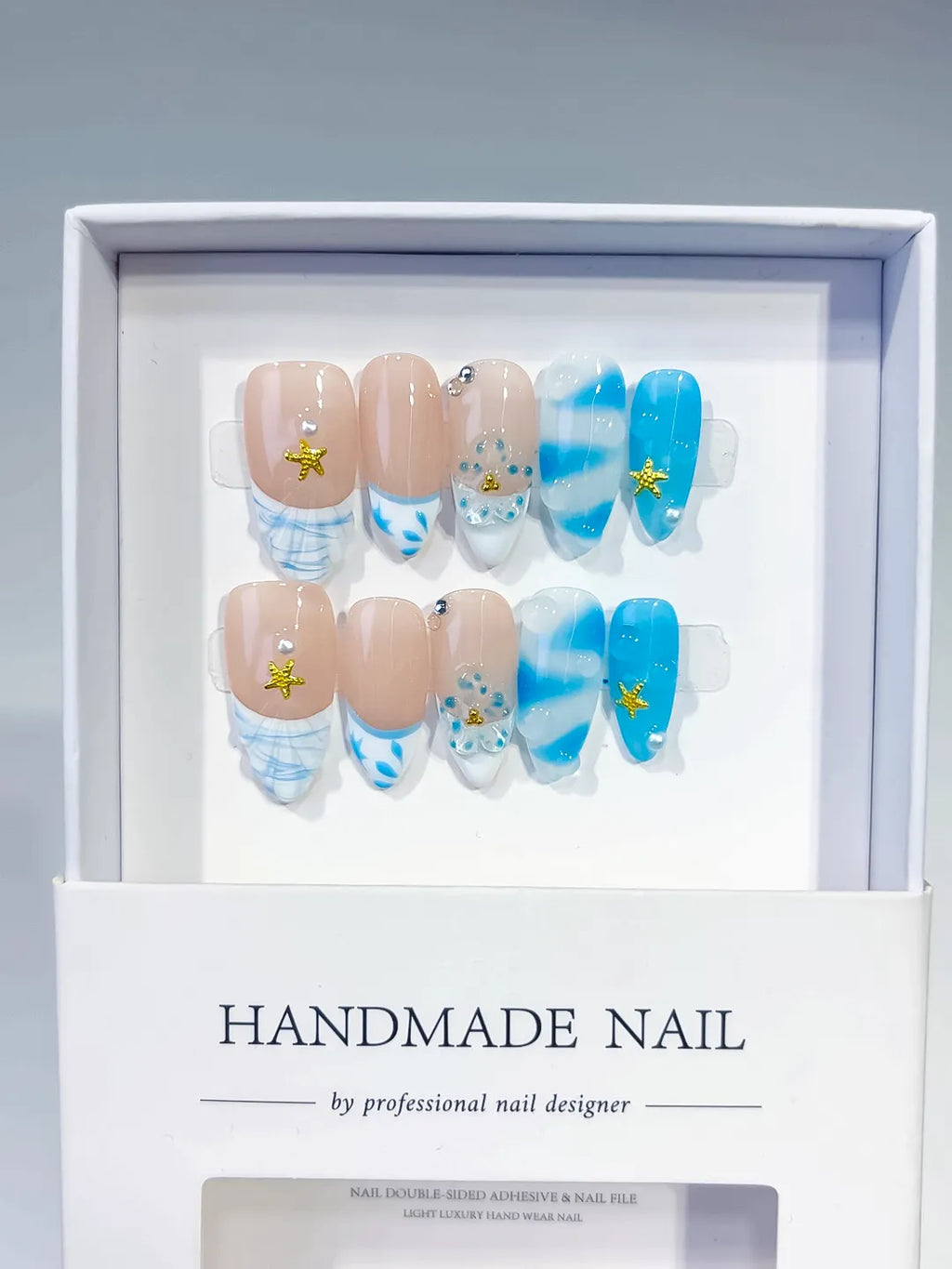 D514 - Medium Nude Blue Almond French tip Star Rhinestone