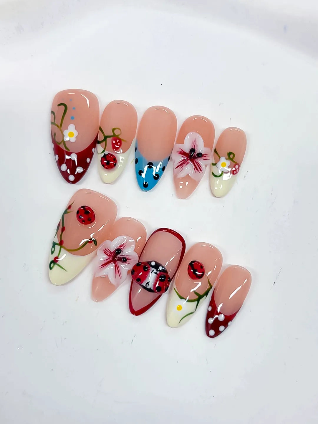 D522 - Medium Nude Red Almond Abstract Flower Ladybug
