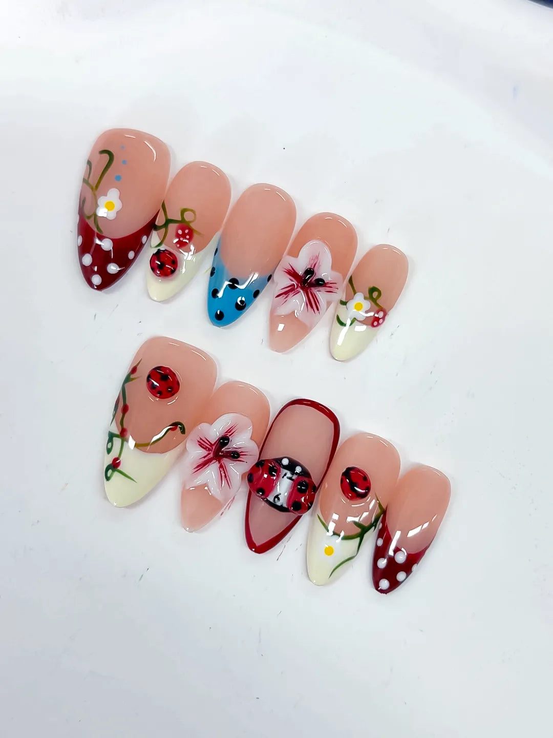 D522 - Medium Nude Red Almond Abstract Flower Ladybug