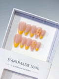 D529 - Medium Nude Yellow Almond French tip Flower Rhinestone