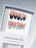 D557 - Medium Nude Black Almond French tip Flower Dot Pattern